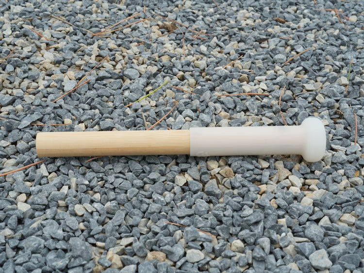 Crystal-tipped knocking stick