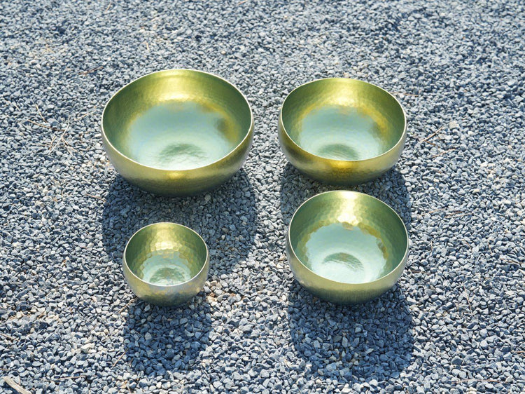 Titanium singing bowls